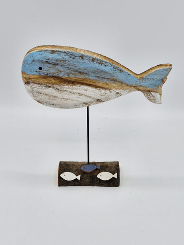 wooden whale with fish