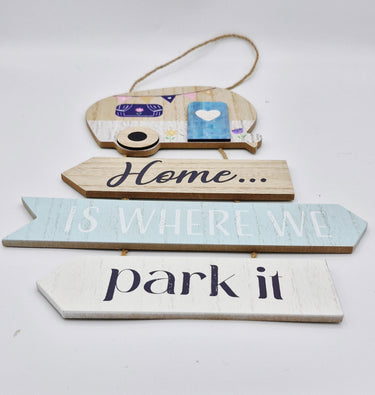 wooden caravan sign