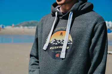 Unisex Charcoal Hoody "Rush Hour Sunset Mountain Biker"