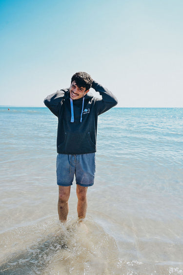 Unisex Charcoal Hoody "Catching The Surf Tywyn"