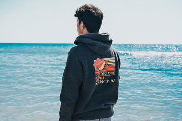 Unisex Charcoal Hoody "Catching The Surf Tywyn"