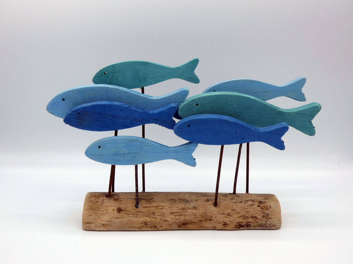 Blue and Green Wooden School Of Fish