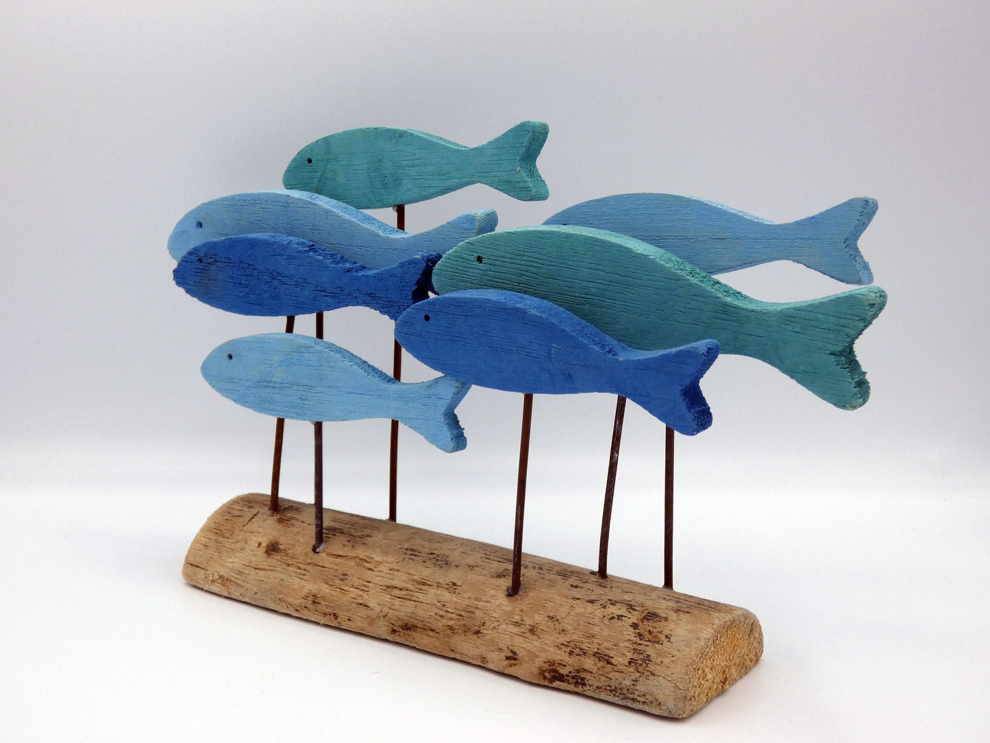 Blue and Green Wooden School Of Fish