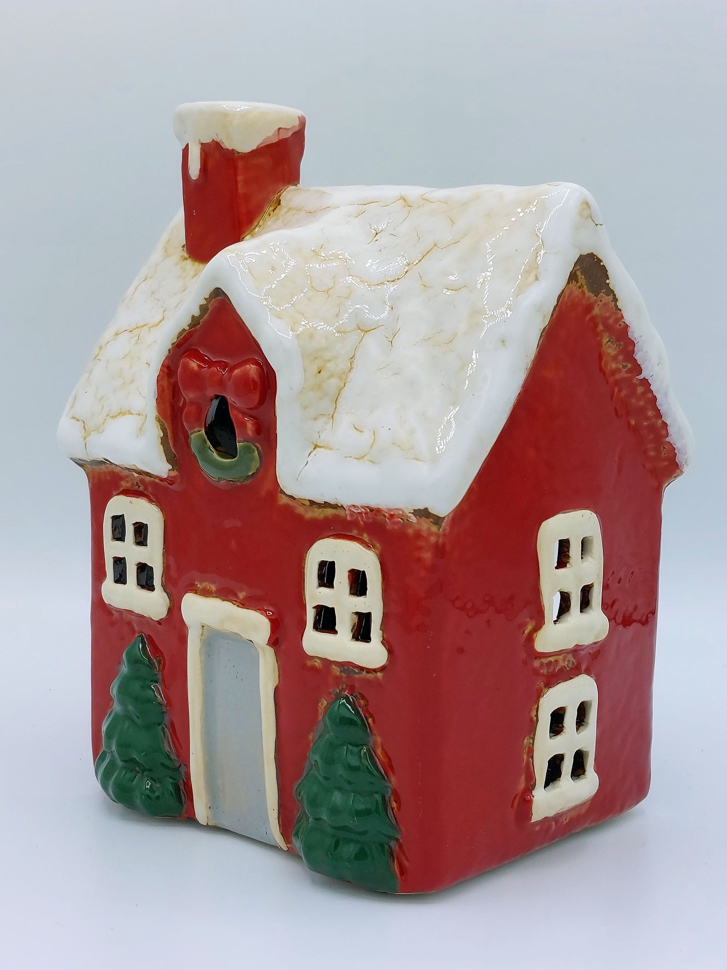Little Red Ceramic House With Trees and Wreath