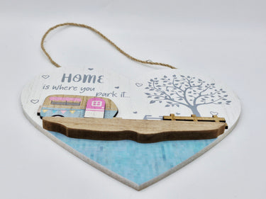 colourful wooden caravan  heart sign