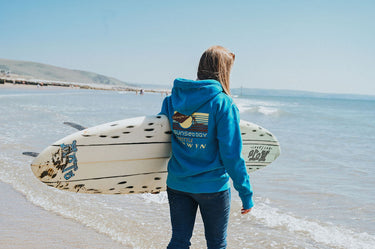 Unisex Hoody In Blue " Retro Print Catching The Surf Tywyn"