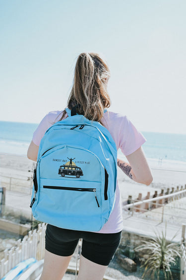 Backpack/Rucksack In Light Blue - Retro Campervan At Sunset Logo