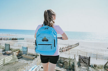 Backpack/Rucksack In Light Blue - Retro Campervan At Sunset Logo