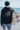 Unisex Black Hoody "Surf Barmouth, Orange Palms"