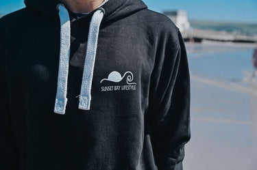Unisex Black Hoody "Surf Barmouth, Orange Palms"